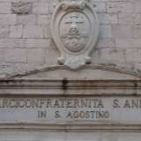 La chiesa fu dedicata dai suoi cortigiani al patrono di Milano come ricordato da un�iscrizione quasi invisibile al di sopra della porta: Divo Ambrosio Mediolanenses sacellum erexerunt anno Domini 1518 (�I milanesi eressero questa tempio per sant�Ambrogio nell�anno del Signore 1518�)
